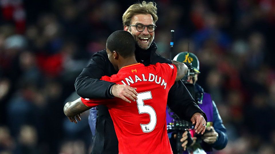 Georginio Wijnaldum melakukan selebrasi Jurgen Klopp Copyright: © Clive Brunskill/Getty Images